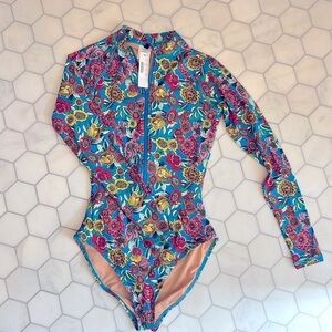 Jcrew long sleeved zip up swimsuit. Size 6. NWT